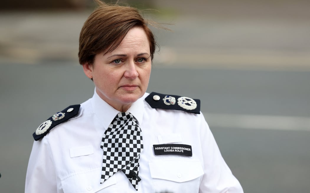 Metropolitan Police Assistant Commissioner Louisa Rolfe speaks during a news conference near the scene of a crime in Hainault, east of London on April 30, 2024, where a 36-year-old man wielding a sword was arrested following an attack on members of the public and two police officers. A 14-year-old boy died on Tuesday after a man wielding a sword stabbed the youth, two police officers and two other people, in a street attack in east London, police said. The man used what appeared to be a Samurai-type sword in the Hainault district shortly before 7:00 am (0600 GMT). (Photo by Adrian DENNIS / AFP)