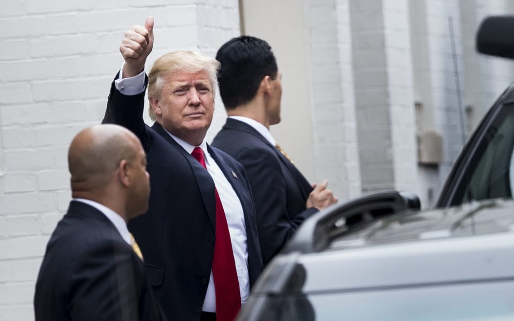 Republican US Presidential candidate Donald Trump arrives for a meeting with Speaker of the House Paul Ryan (R-WI) at the National Republican Congressional Committee May 12, 2016 in Washington, DC.
