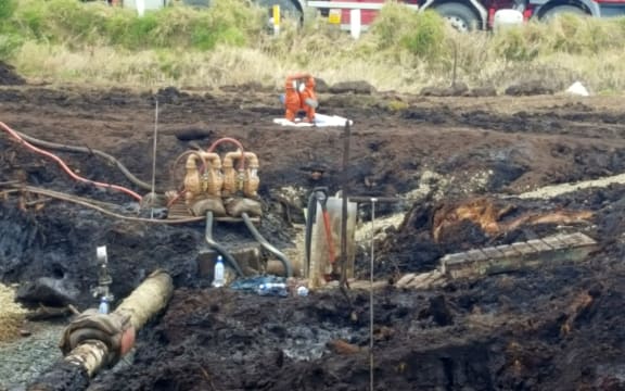 The site of the damaged pipe, seen in the lower left of the photo.