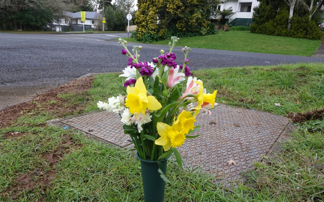 Fresh flowers mark the spot where an 11-year-old Kaikohe girl was killed by an allegedly speeding car on Wednesday.