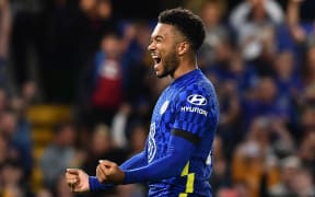 Chelsea's English defender Reece James celebrates scoring the winning penalty during the English League Cup third round football match between Chelsea and Aston Villa at Stamford Bridge in London on September 22, 2021.