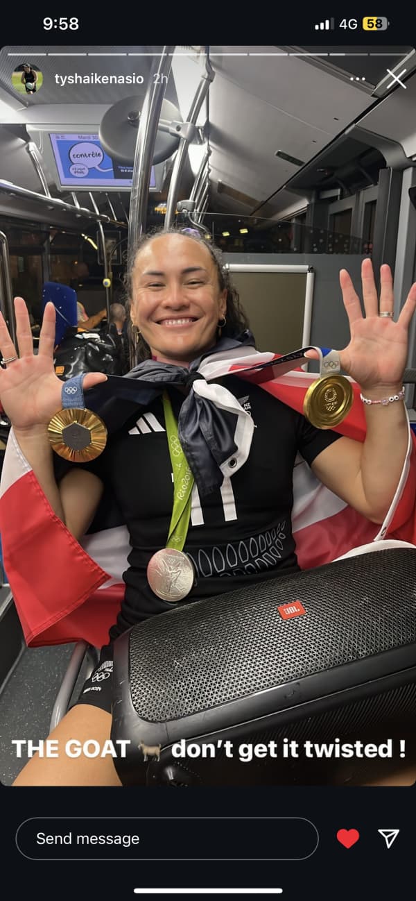 Portia Woodman-Wickliffe with medals after winning gold in Paris.
