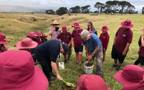 Mahia school children assist with the release of Dung beetles on Mahia Peninsula