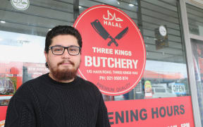 Mobile software developer Mohamed Soliman standing outside the halal butchery, Three Kings, in Auckland.