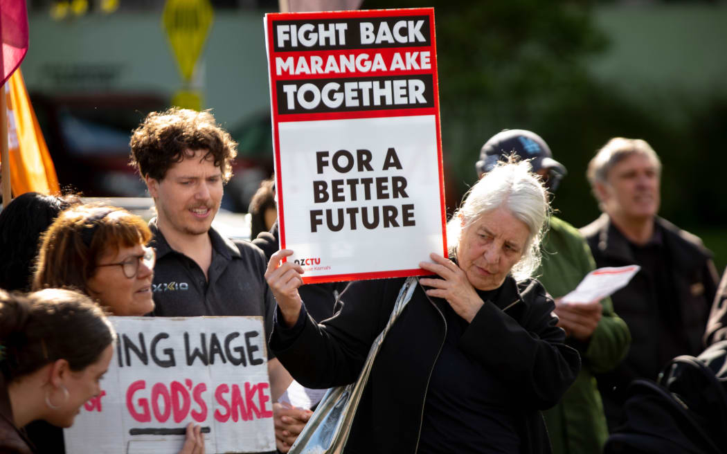 About 200 people have gathered outside Resene's head office in Lower Hutt to protest for a living wage.