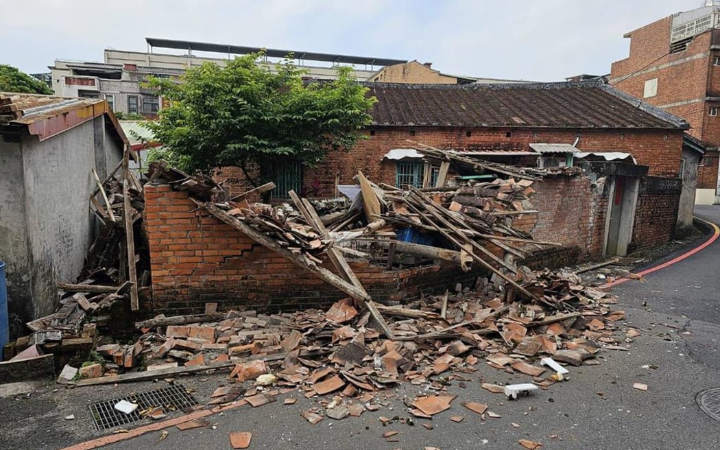 (240403) -- TAIPEI, April 3, 2024 (Xinhua) -- This photo taken on April 3, 2024 shows a damaged house in Yilan County, southeast China's Taiwan. Four people died and another 97 were injured in a 7.3-magnitude earthquake that hit the sea area near Hualien in Taiwan on Wednesday morning. (China Times/Handout via Xinhua) (Photo by CHINA TIMES / XINHUA / Xinhua via AFP)