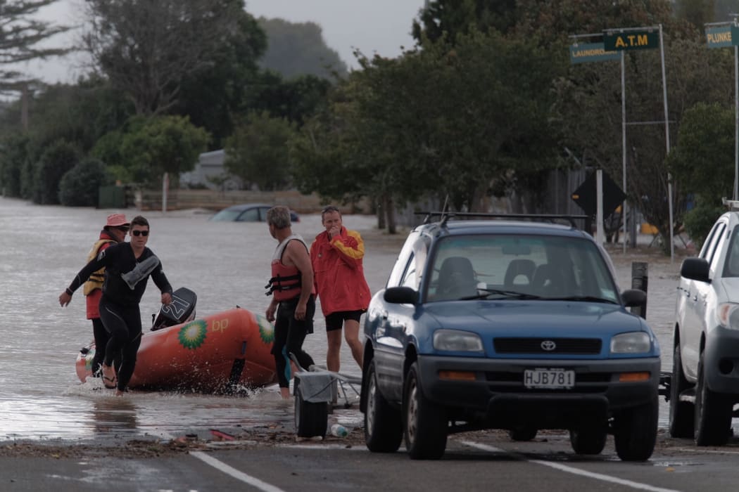 A boat being used to get around in the floodwaters at Edgecumbe.