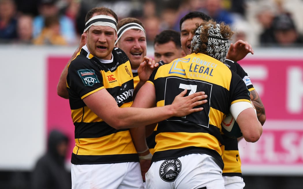 Taranaki players celebrate with Michael Loft his try during the Bunnings NPC Rugby game Tasman v Taranaki. Trafalgar Park, Nelson, New Zealand. Sunday 6 October 2024. ©Copyright Photo: Chris Symes / www.photosport.nz