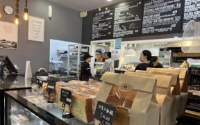 21 Grams Café & Patisserie has been run by a Chinese couple on Auckland’s North Shore for nearly eight years.