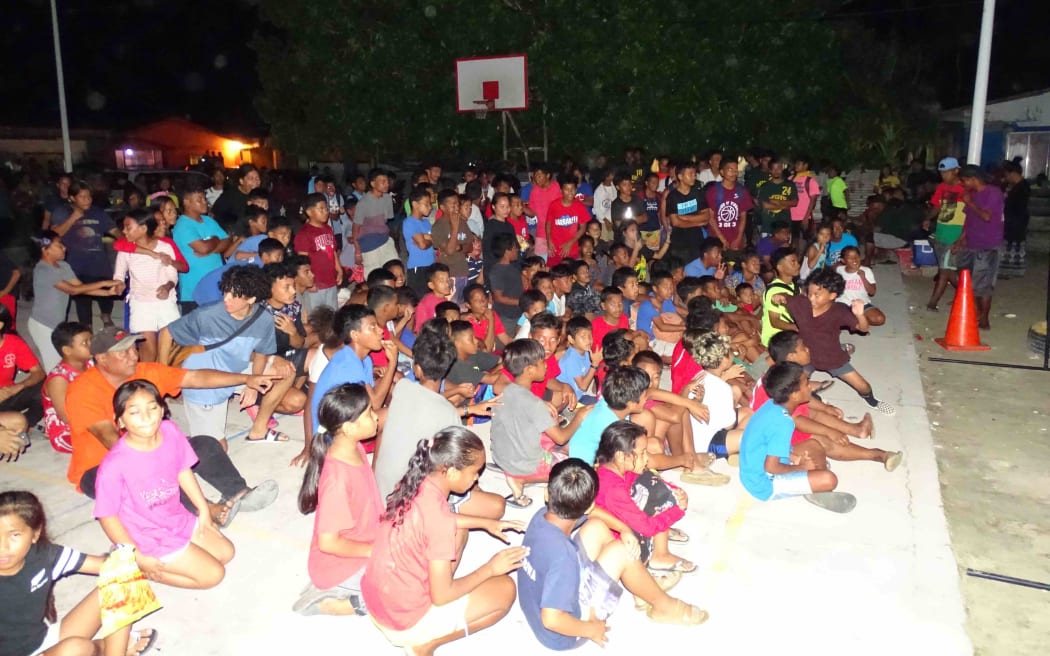Marshall Islands residents have seen their pocketbooks hard hit by skyrocketing prices across the board, with fuel hitting $7 per gallon this past week for the first time ever. Pictured: A crowd of young people at a sports event in downtown Majuro in November 2021.