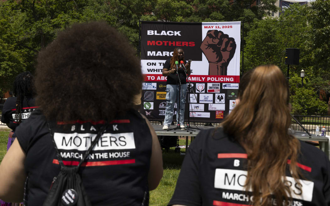 People gather against the Child Protective Services (CPS) in Lafayette Square in Washington, DC, USA, on 11 May, 2025, to condemn policies that target and separate Black families.