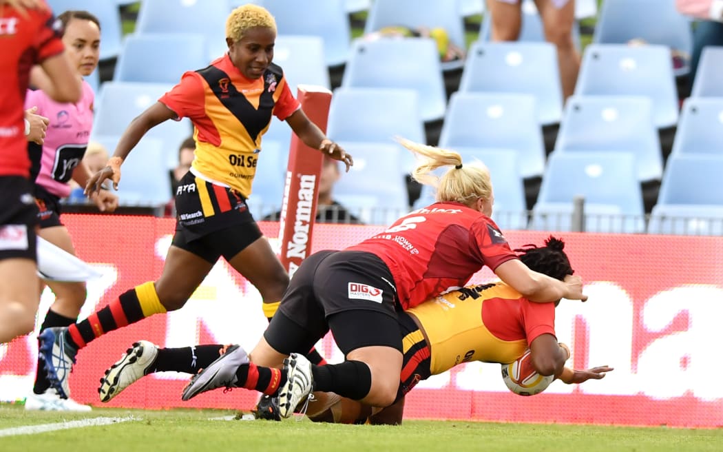 Christie Bulhage scores for the Orchids.