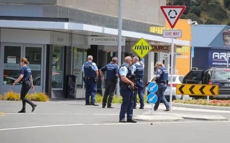 Police swarmed Taradale CBD following gang-related altercations on Sunday.Caption:Police swarmed Taradale CBD following gang-related altercations on Sunday.
