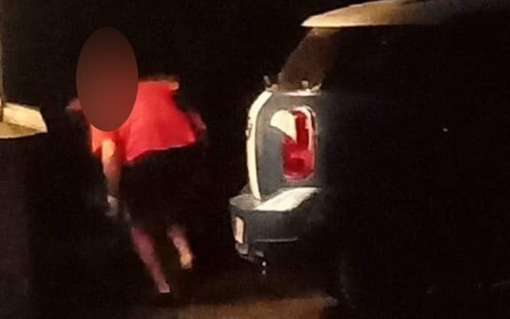 A Rotorua mum was told by her neighbour's landlord to lock her door after a strange man was seen peeping through her kitchen window.