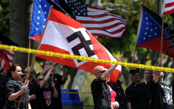 Members of the neo-nazi group, The American National Socialist Movement, protest during a rally in front of the Los Angeles City Hall, on April 17, 2010.