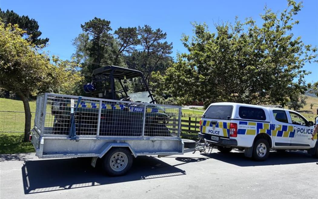 Police vehicle and trailer arrive at chopper scene near Wellington