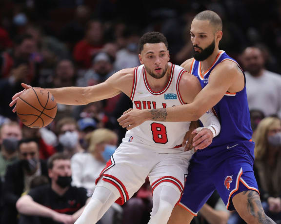 Zach LaVine #8 of the Chicago Bulls moves against Evan Fournier #13 of the New York Knicks at the United Centre on October 28.