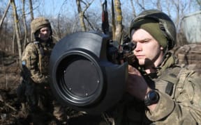 Servicemen of Ukrainian Military Forces on the front-line with Russia-backed separatists near Novognativka village, Donetsk region,