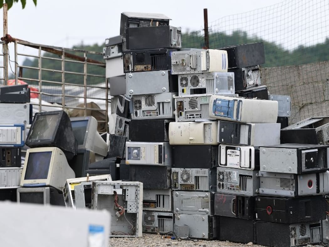 View of a waste recycling site piled with scrapped home appliances in Guiyang city, southwest China's Guizhou province
