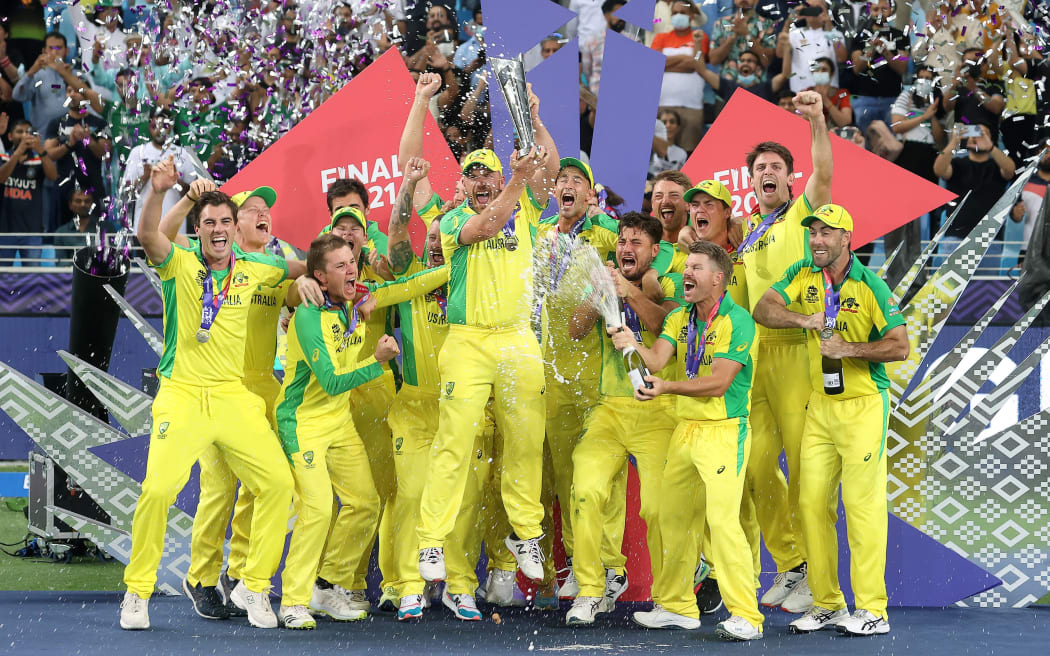 The Australian team celebrate after winning the ICC Men's T20 World Cup final cricket match between Australia and New Zealand at Dubai International Cricket Stadium in Dubai, United Arab Emirates, Sunday, November 14, 2021.