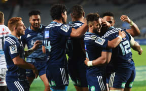 Blues players celebrate George Moala's try against the Bulls 2015.