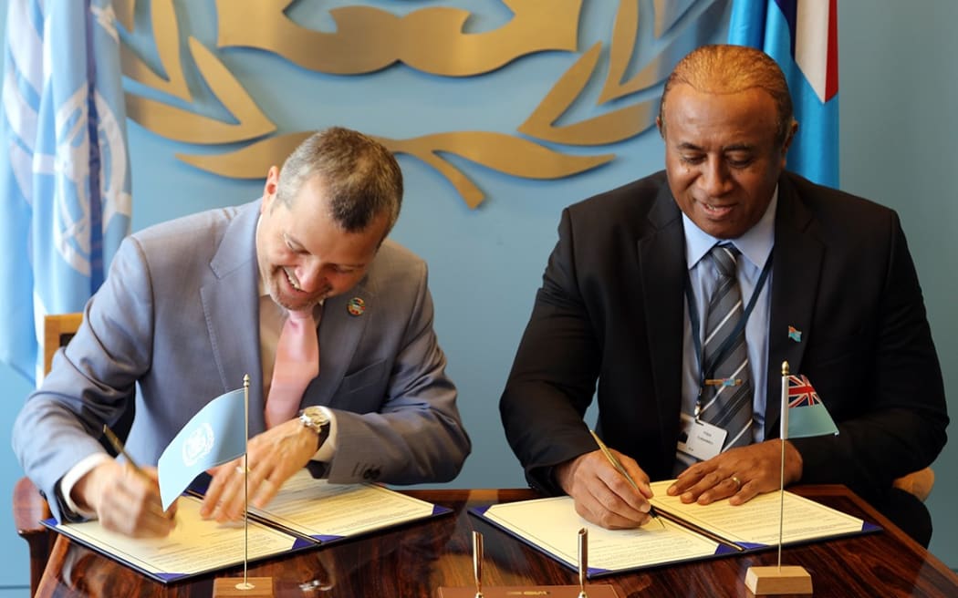 IMO secretary-general Arsenio Dominguez and Fiji's Transport Minister Ro Filipe Tuisawau at the IMO headquaters in London on Monday. 18 March 2024