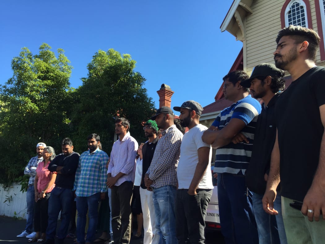 The Indian students and their supporters outside the Auckland Unitary Church in Ponsonby.