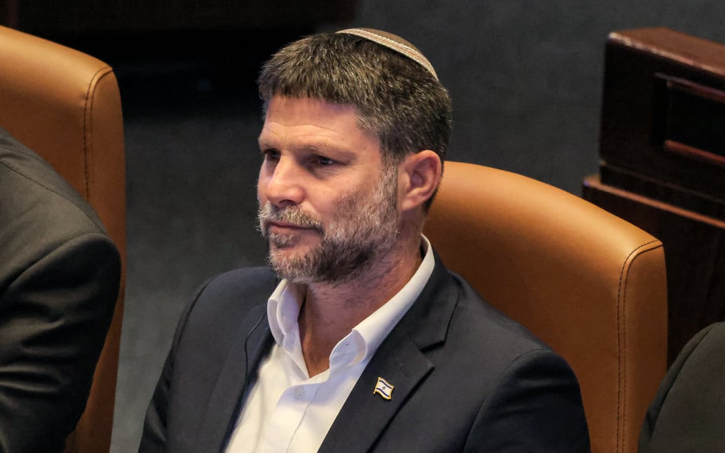 Israel's Finance Minister Bezalel Smotrich attend the address of Argentina's President to a session of the Israeli parliament (Knesset) at its headquarters in Jerusalem on June 11, 2025. (Photo by Menahem KAHANA / AFP)