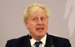 Britain's Prime Minister Boris Johnson addresses a press conference during the Commonwealth Heads of Government Meeting (CHOGM) at Lemigo Hotel in Kigali on 24 June, 2022. Leaders of Commonwealth countries meet every two years for the Commonwealth Heads of Government Meeting (CHOGM), hosted by different member countries on a rotating basis. Since 1971, a total of 24 meetings have been held, with the most recent being in the UK in 2018.