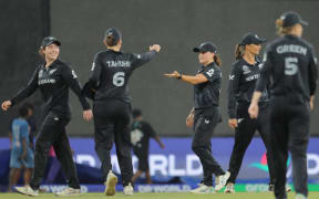 Players leaving the ground as rain stops play during the White Ferns match with Pakistan.