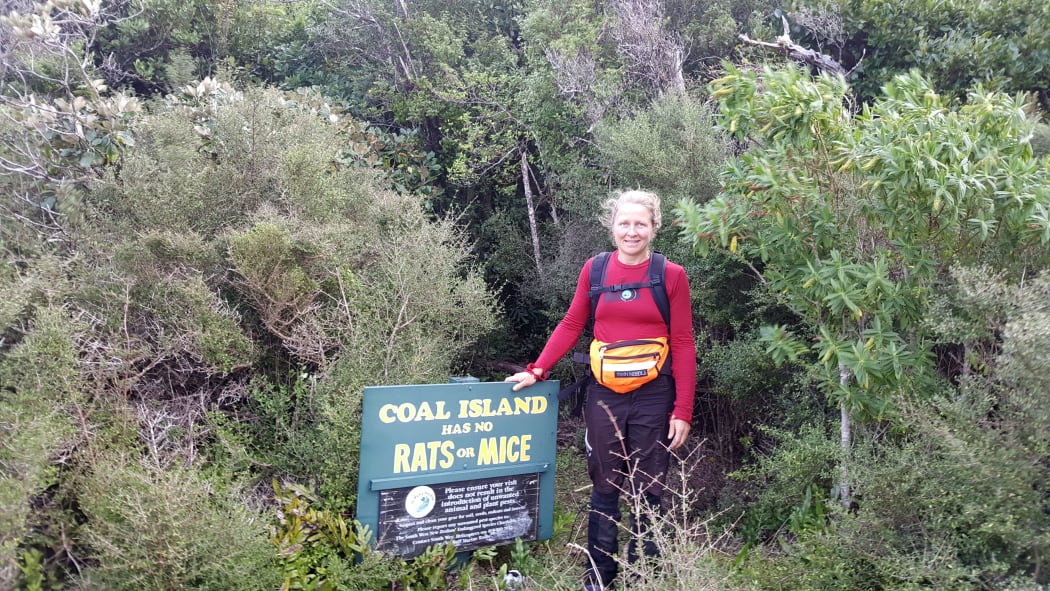 Megan Willans, a trustee of the Coal Island Trust, at the end of a day checking predator traps on the remote Fiordland island.