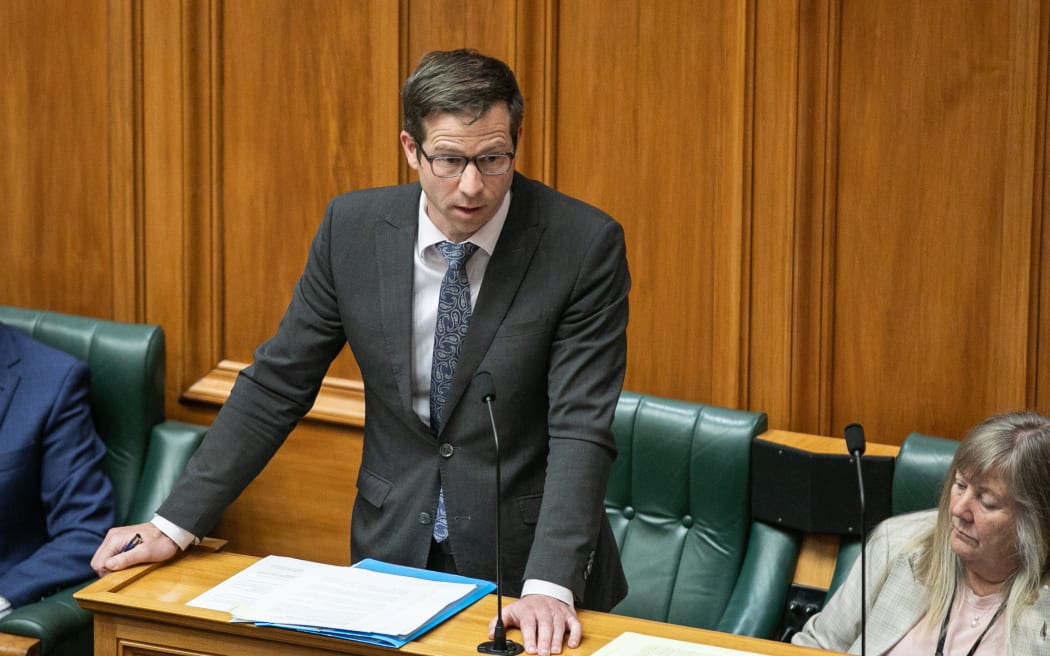 Minister Chris Penk stands up in the debating chamber to deliver a Ministerial Statement on the sinking of the HMNZS Manawanui