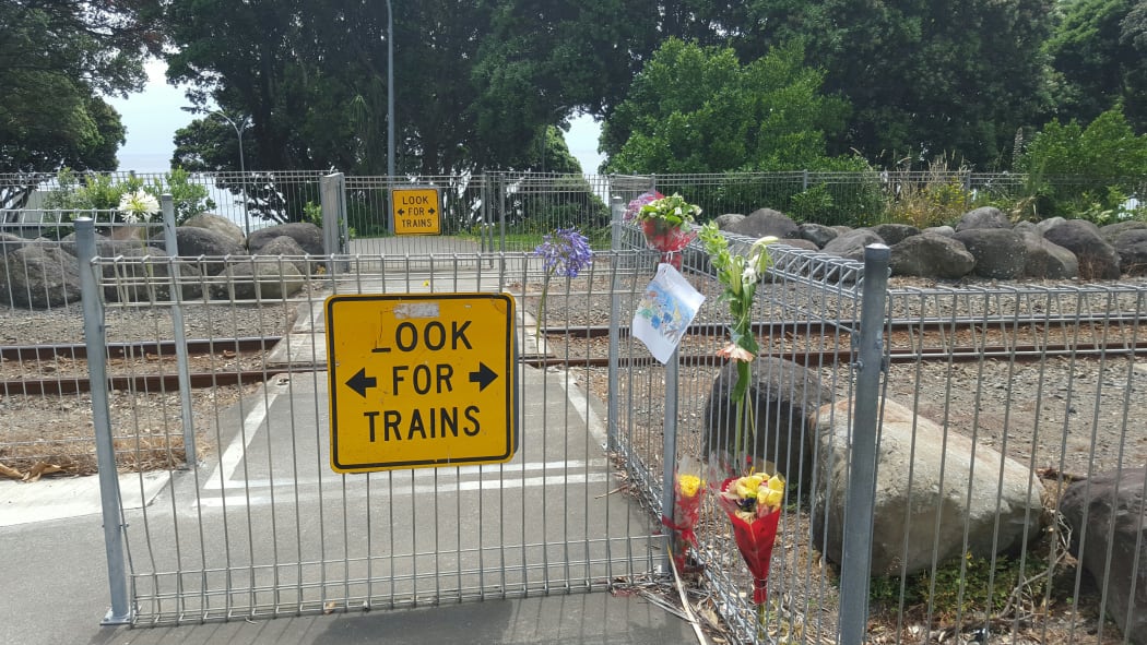 Memorial tributes at the rail crossing where Matthew Meijer died.