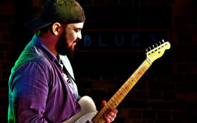Chris Armour with broken string