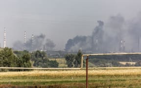 Plumes of smoke rise from Lysychansk during heavy fighting between Ukrainian forces with Russian troops on 1 July 2022.