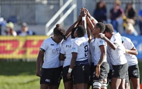 The Fijiana team huddle during the USA Sevens in Colorado.