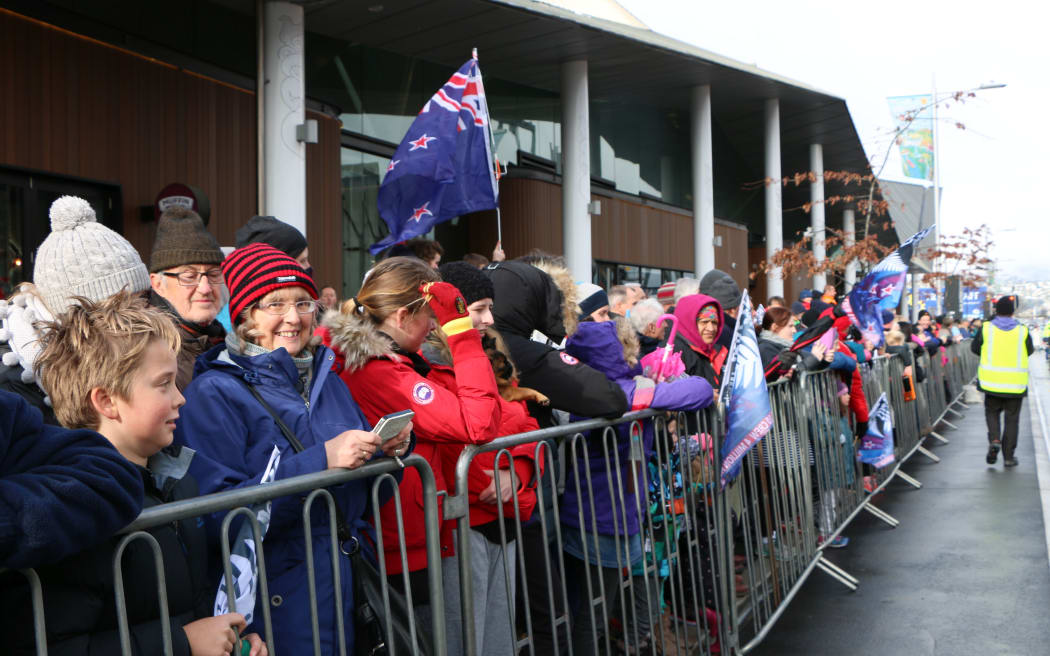 Crowds lined the parade route despite the inclement weather.