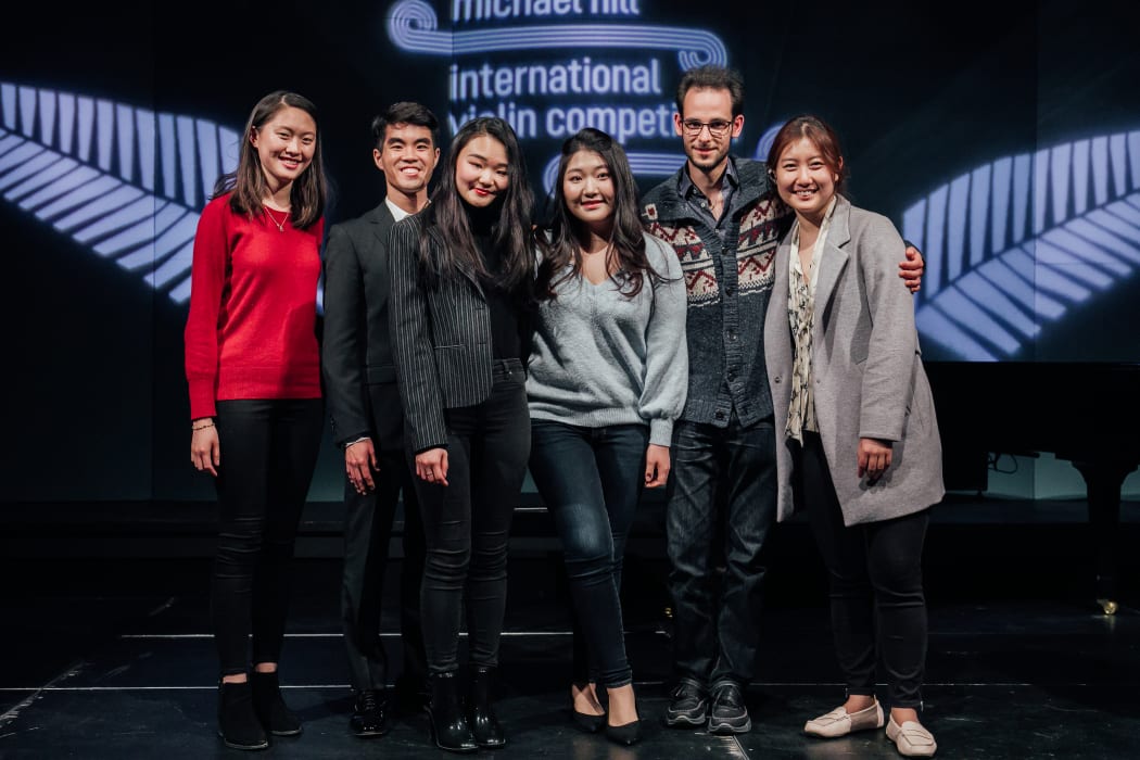 Semi-finalists, Michael Hill Violin Competition 2019. L- R: Victoria Wong (Australia), Eric Tsai (USA), Angela Sin Ying Chan (Hong Kong), Hannah Cho (USA), Jevgēnijs Čepoveckis (Latvia), Do Gyung (Anna) Im (South Korea).