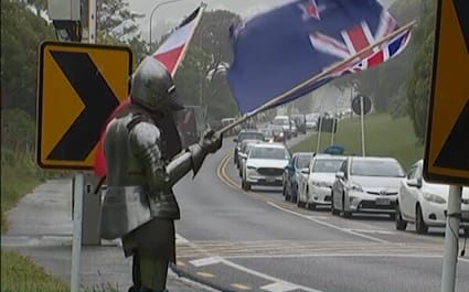 A protestor confronting traffic on Saturday in Wellington - in full suit of armour.