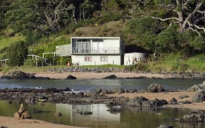 Remote bach holiday house on January 25 2013 in Cable bay, New Zealand. More than 50,000 baches exist around New Zealand
