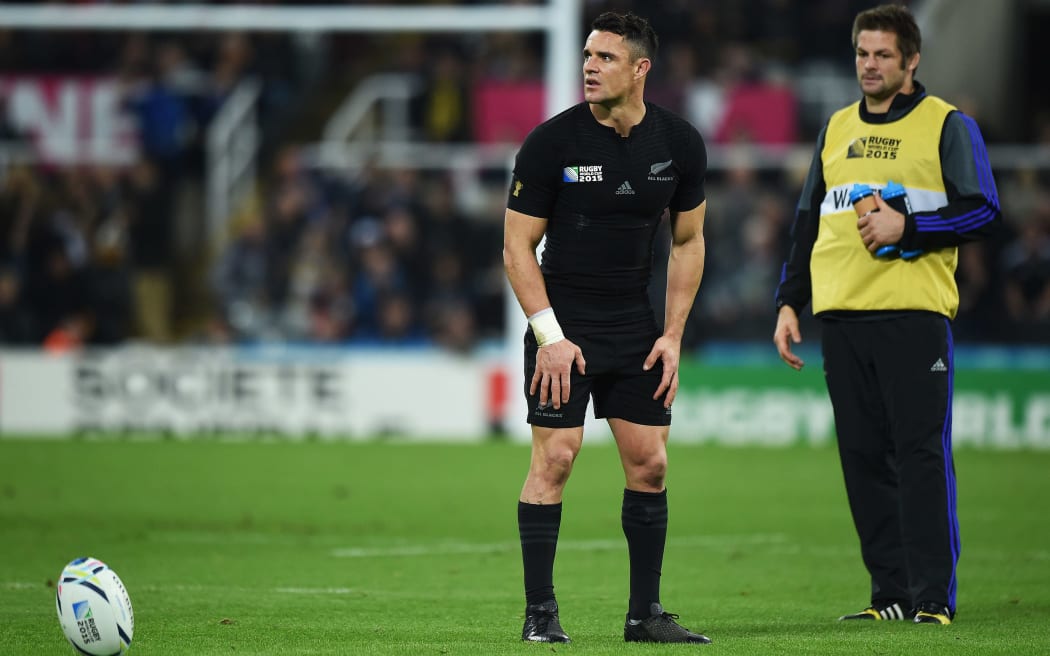 Dan Carter lines up a conversion as Richie McCaw looks on during the All Blacks v Tonga Rugby World Cup 2015 match. St James' Park in Newcastle. UK. Friday 9 October 2015. Copyright Photo: Andrew Cornaga / www.Photosport.nz