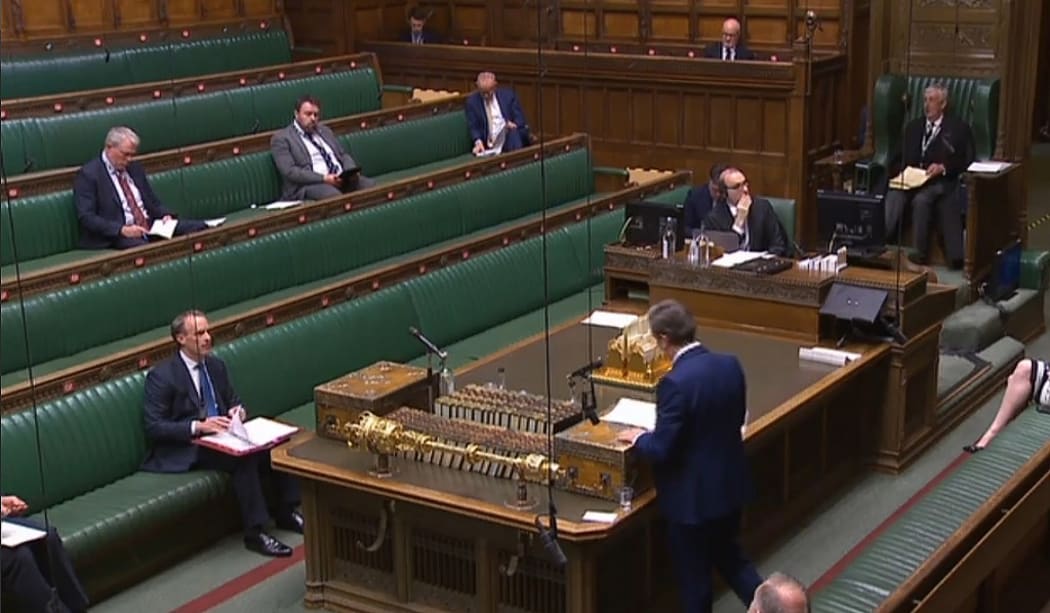 A video grab from footage broadcast by the UK Parliament's Parliamentary Recording Unit (PRU) shows Britain's main opposition Labour Party leader Keir Starmer standing and speaking during Prime Minister's Question time.