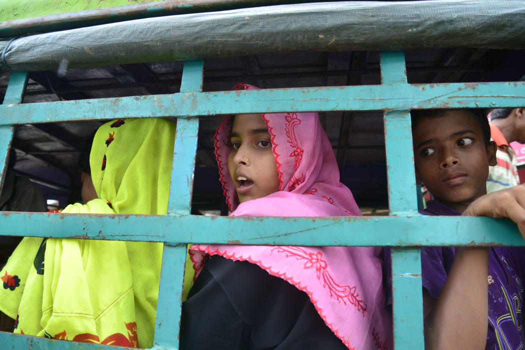 Rohingya refugees being moved to a camp after crossing the border from Myanmar into Bangladesh.