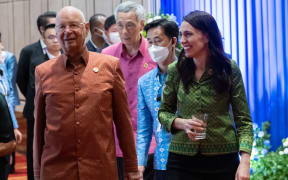 New Zealand Prime Minister Jacinda Ardern (R) attends the East Asia Summit Gala dinner in Phnom Penh, Cambodia, November 12, 2022. (Photo by SAUL LOEB / AFP)