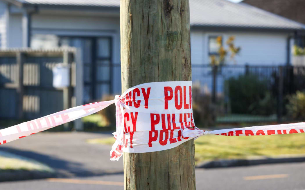 Police on Clyde Road the day after they fatally shot a woman, and critically wounded a man in Christchurch.