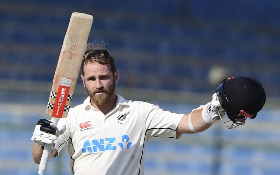 New Zealand's Kane Williamson celebrates scoring a double century against Pakistan in Karachi, 2022.