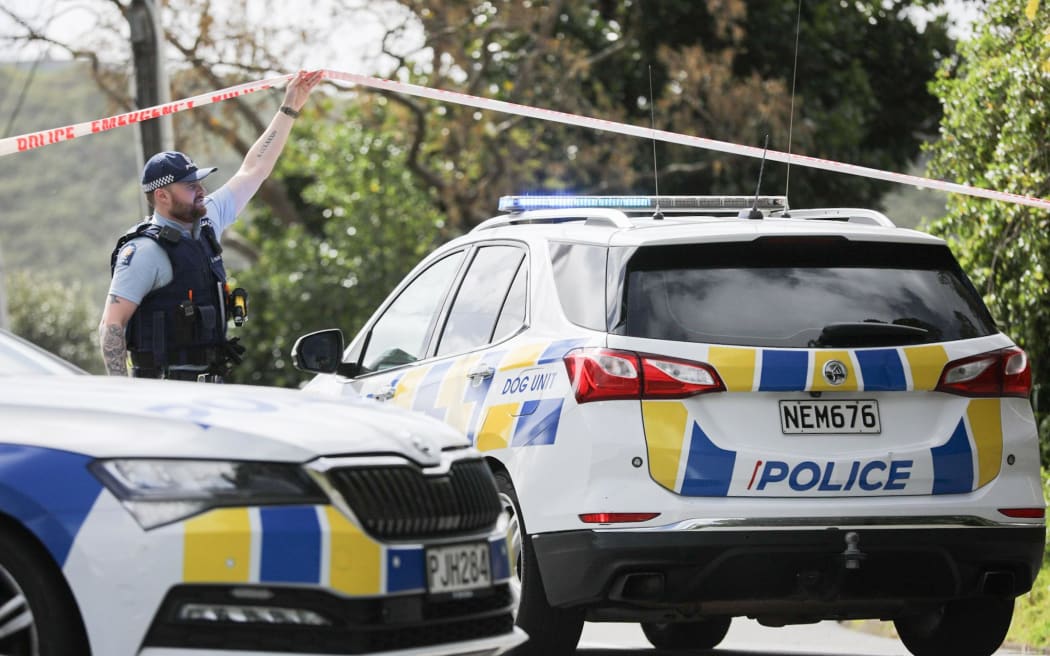 Police cars are seen blocking the road in Miramar, Wellington, on 16 October, 2023 after a person was found dead at a residential address.