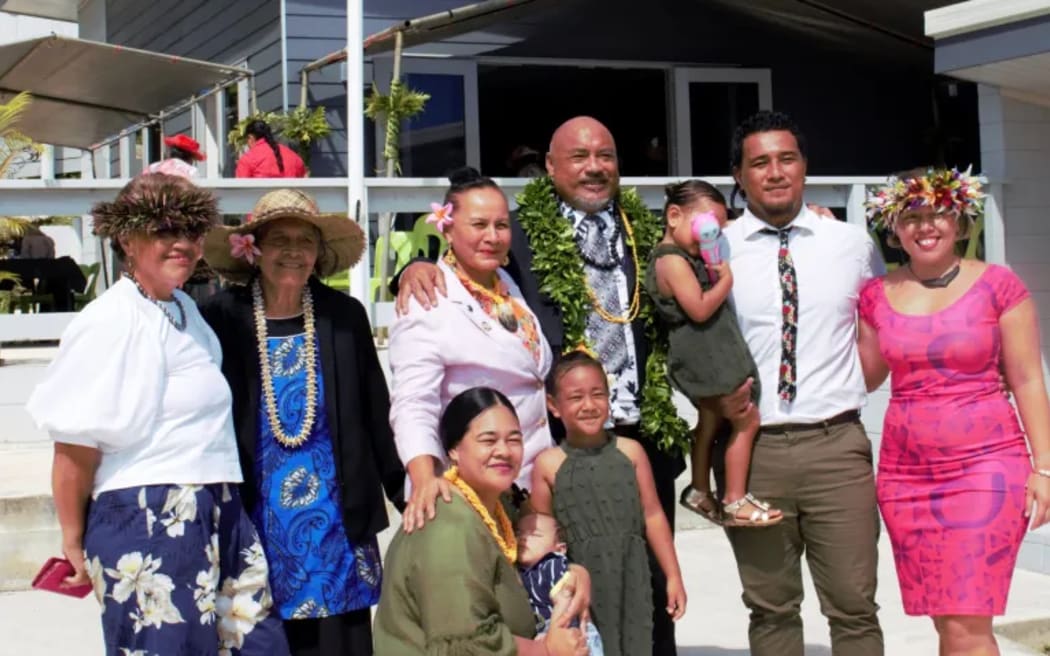 Ian Hipa (centre), representative of Hikutavake with his wife Emi and their family after the ceremony