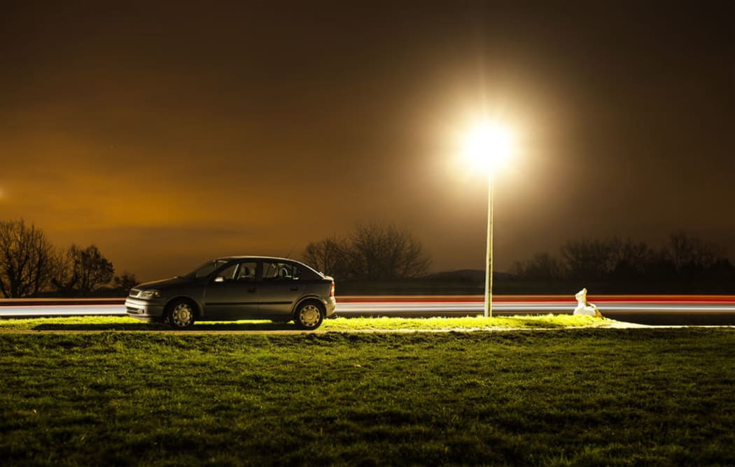 Car parked in the dark
