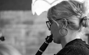 Leah Thomas playing the clarinet
